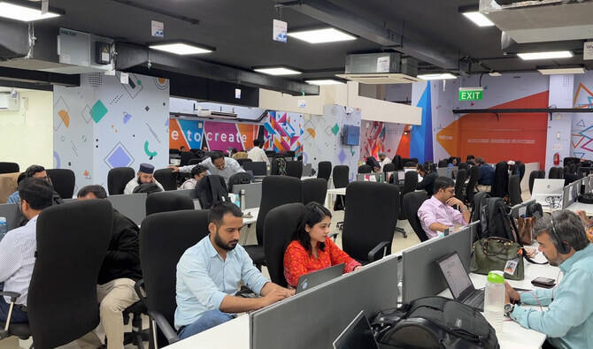 In this photograph, taken on March 8, 2024, people work at their stations at the Systems Limited, one of Pakistan’s largest software export companies, in Karachi. (AN Photo/File)