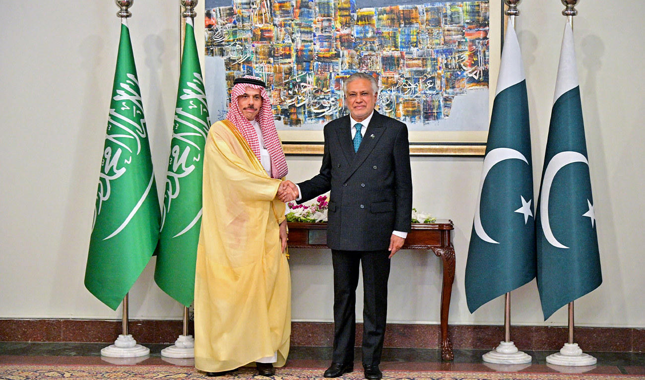 This handout photograph taken on March 29, 2026, shows Pakistan’s Foreign Minister Ishaq Dar shaking hands with his Saudi counterpart Prince Faisal bin Farhan (left), upon his arrival at the Ministry of Foreign Affairs in Islamabad, Pakistan. (MOFA/AFP/File)