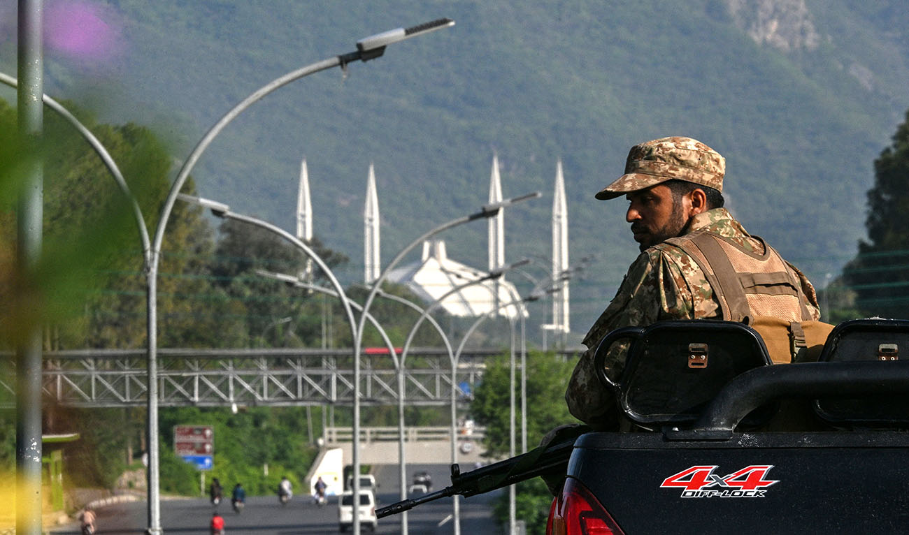 An army personnel keeps watch in the Red Zone area of Islamabad on April 25, 2026. (AFP/File)