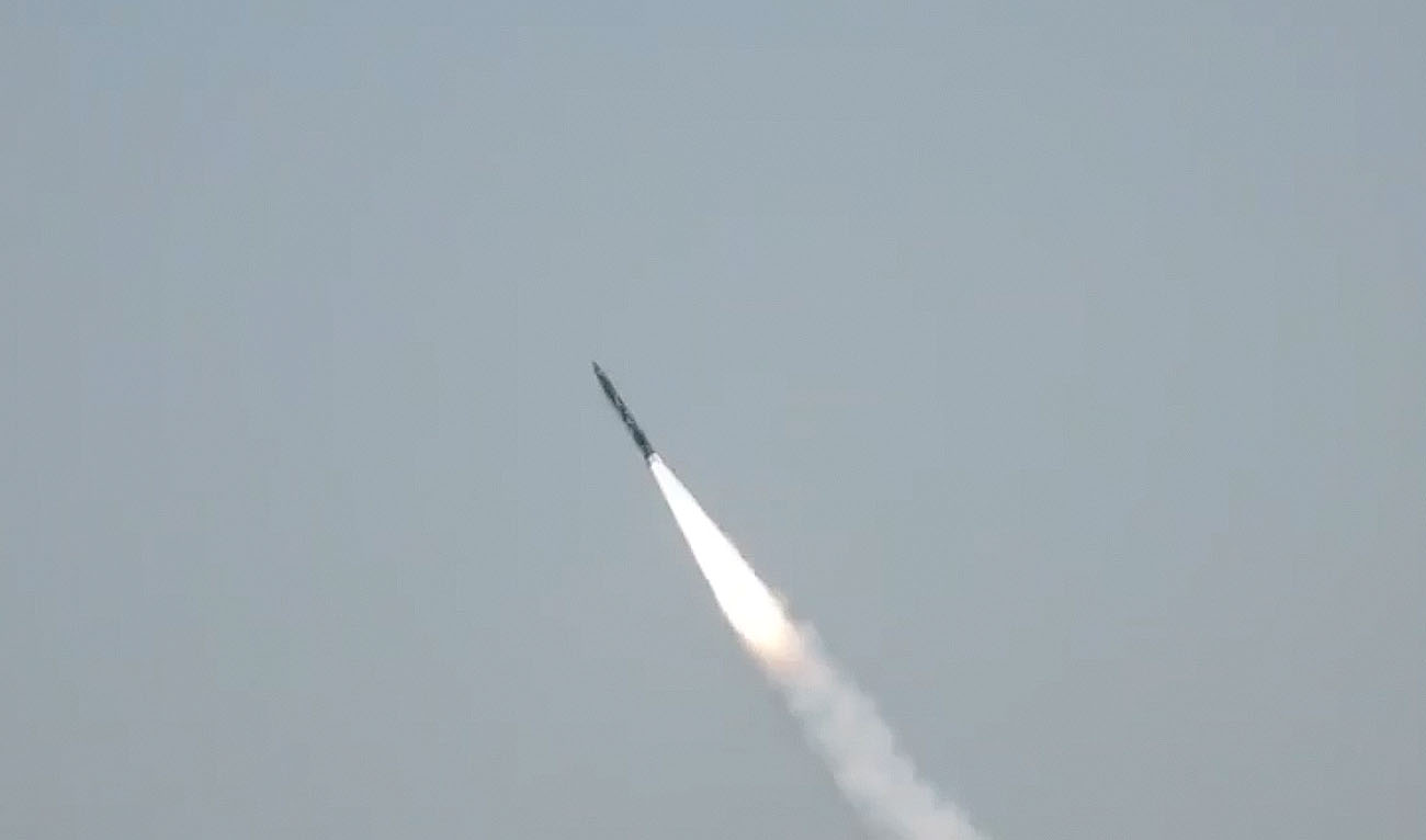 Screengrab from a video released by ISPR shows a training launch of the indigenously developed Fateh-II missile system. (Screengrab/PTV)