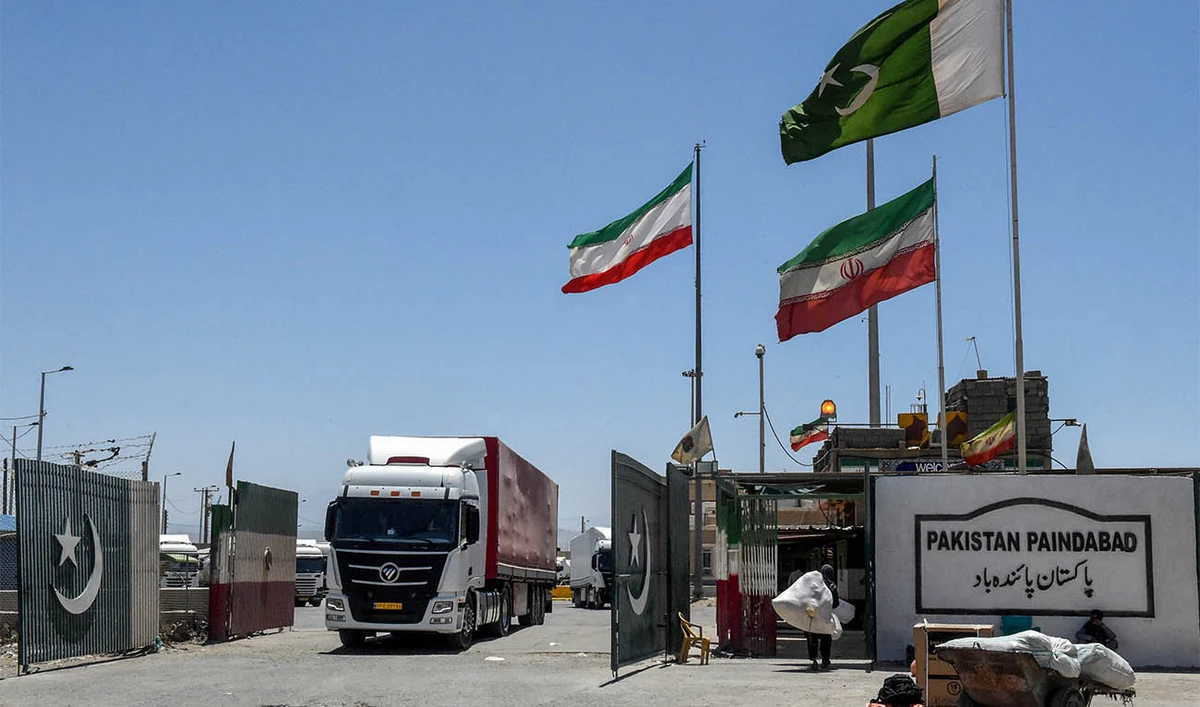 Iranian cargo trucks cross into the Pakistan-Iran border at Taftan, Balochistan province on June 18, 2025, amid the ongoing conflict between Israel and Iran. (AFP/ file)