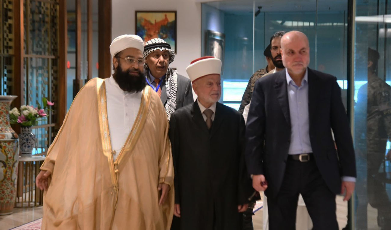 Palestine’s Grand Mufti, Sheikh Muhammad Ahmad Hussein (center), arrives in Islamabad, Pakistan, for an international Islamic conference on May 4, 2026. (APP)