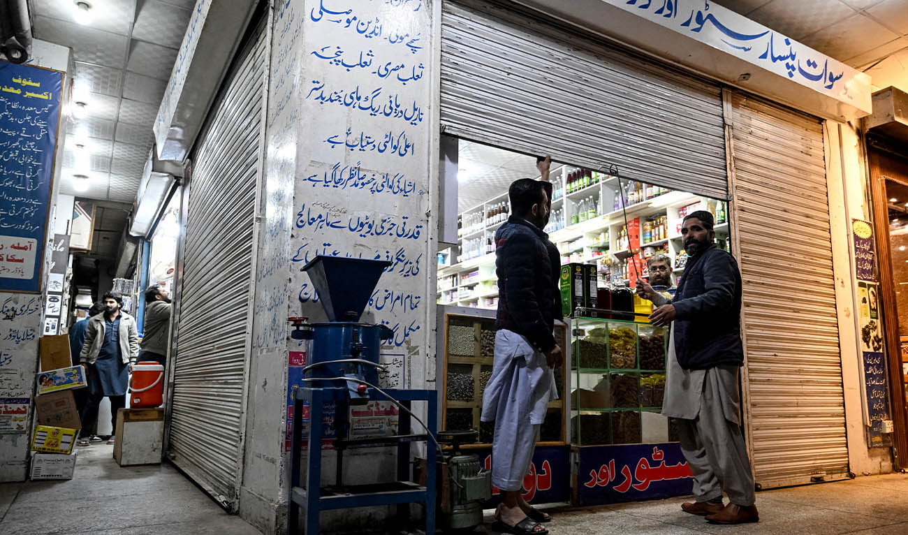 Shopkeepers close their shops early in the evening in Islamabad on April 7, 2026 following the Pakistani government’s decision to shut down markets and shopping malls to conserve energy as fuel prices surge due to the ongoing Middle East war. (AFP/ file)