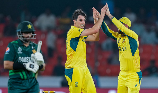 Australia's Pat Cummins celebrates the wicket of Pakistan's Imam-ul-Haq during the ICC Cricket World Cup warmup match between Pakistan and Australia in Hyderabad, India on October 3, 2023. (AP)