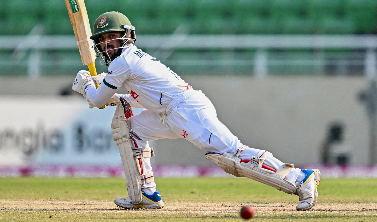 Bangladesh’s Mominul Haque plays a shot during the fourth day of the first Test cricket match between Bangladesh and Pakistan at the Sher-e-Bangla National Stadium in Mirpur on May 11, 2026. (AFP)