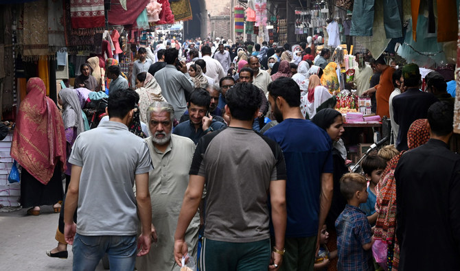 In this picture taken on April 16, 2023, people throng a market area in Lahore, Pakistan. (AFP/File)