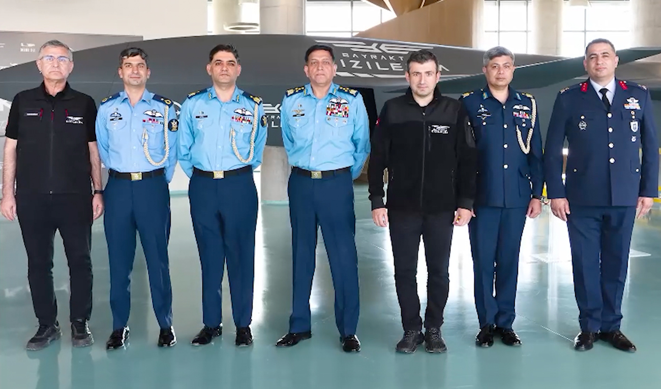 The handout photograph released on May 22, 2026, shows Pakistan Air Force (PAF) Chief, Air Chief Marshal Zaheer Ahmed Baber Sidhu (center), and Chief Technology Officer of Baykar Technologies, Selcuk Bayraktar (third right), posing for a group photo in Turkiye. (Screengrab/PAF)