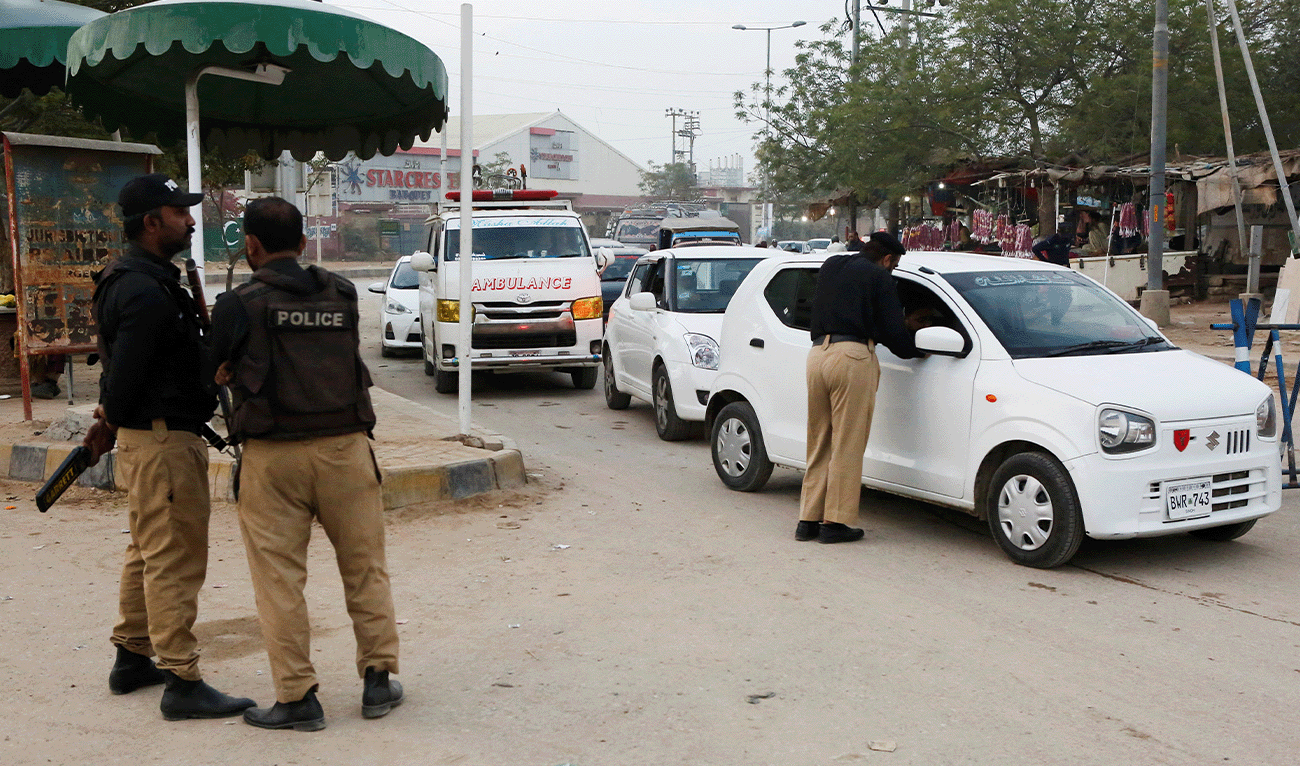 Police officers check vehicles as a security measure, following exchanges of fire between Pakistani and Afghan forces, along a road leading to the airport in Karachi, Pakistan, February 28, 2026. (Reuters/File)