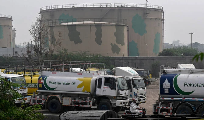 Pakistan State Oil tankers line up along a road before entering a fuel storage facility in Sheikhupura district in Lahore on March 10, 2026. (AFP/ file)