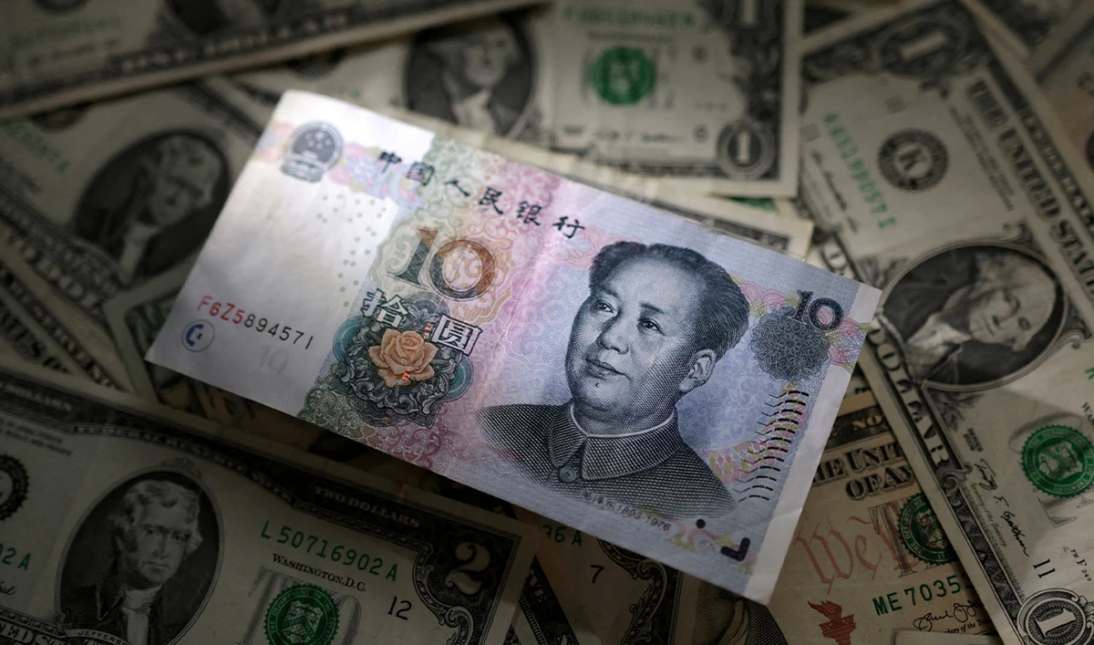 Chinese Yuan and US dollar banknotes are seen in this illustration taken March 10, 2023. (reuters/File)