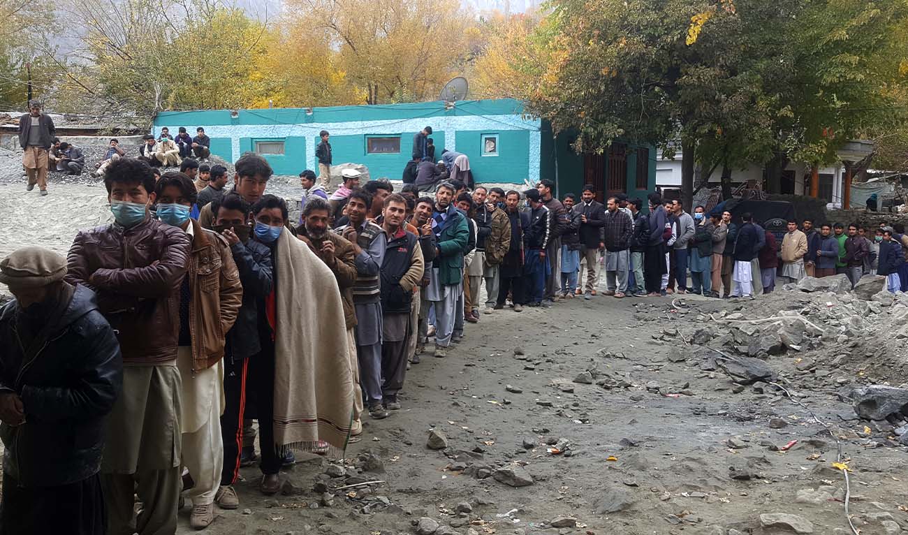 People queue to cast their ballot at a polling station during the legislative assembly election in Skardu city in Gilgit-Baltistan region of Pakistan on November 15, 2020. (AFP/ file)