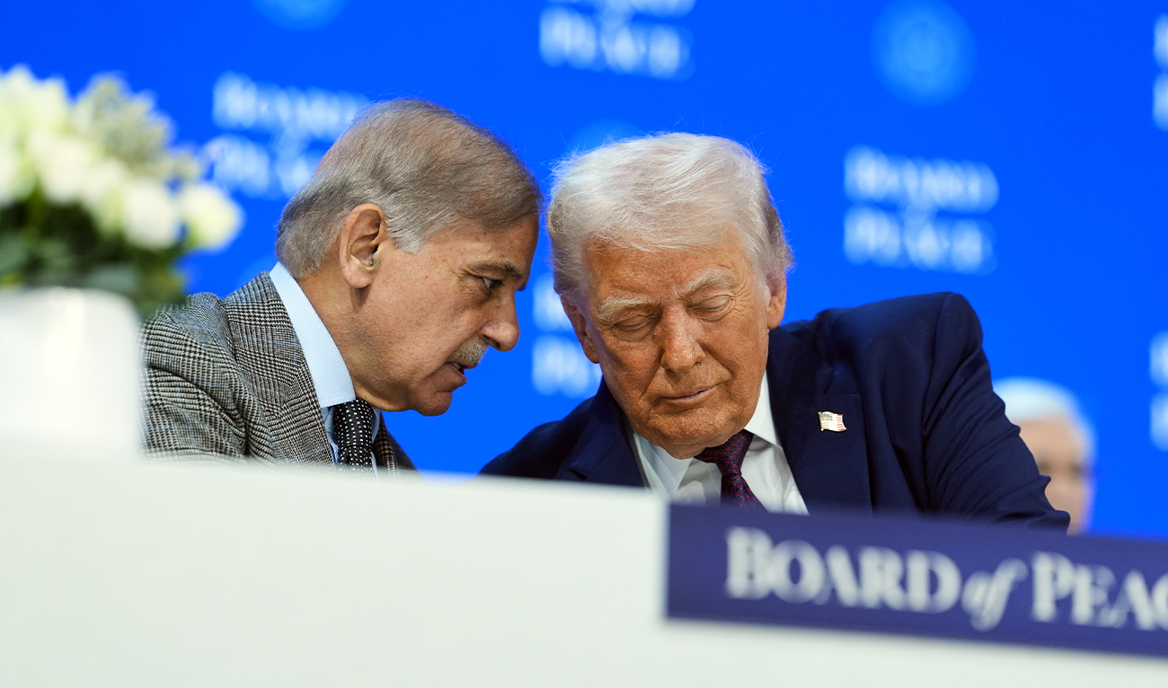 Prime Minister Shehbaz Sharif (left) speaks with US President Donald Trump at the “Board of Peace” meeting during the World Economic Forum (WEF) 2026 in Davos on January 22, 2026. (AFP/File)