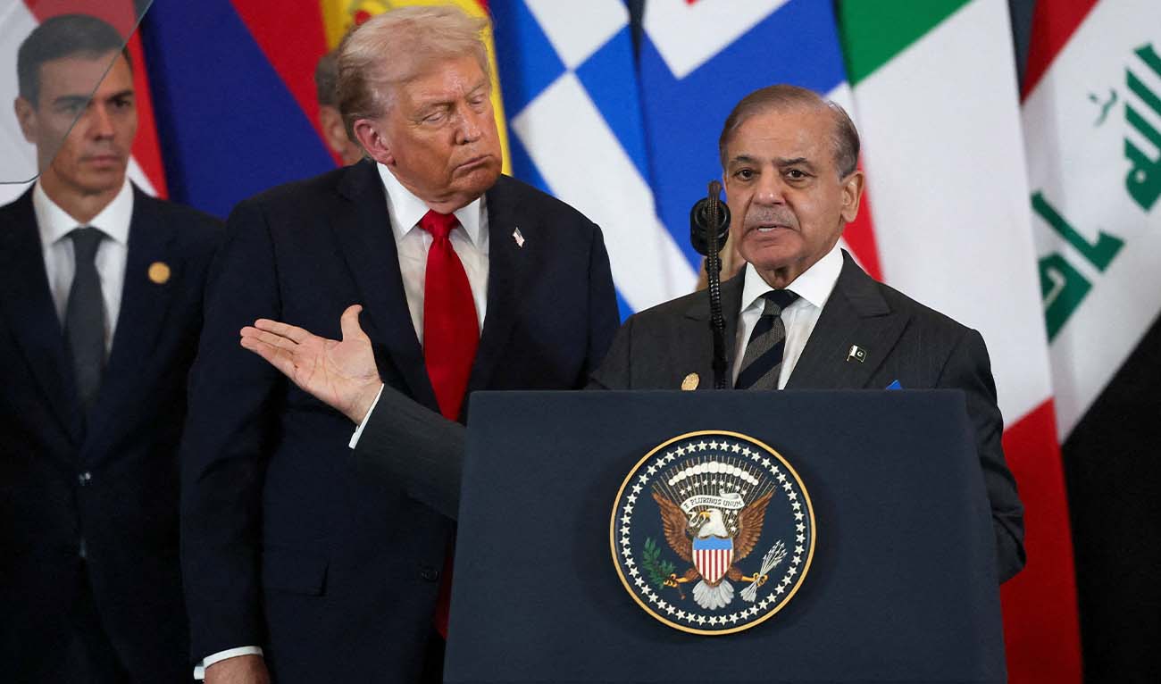 Pakistani Prime Minister Shehbaz Sharif (R) speaks as US President Donald Trump listens during the Gaza summit in Sharm El-Sheikh on October 13, 2025. (AFP/ file)