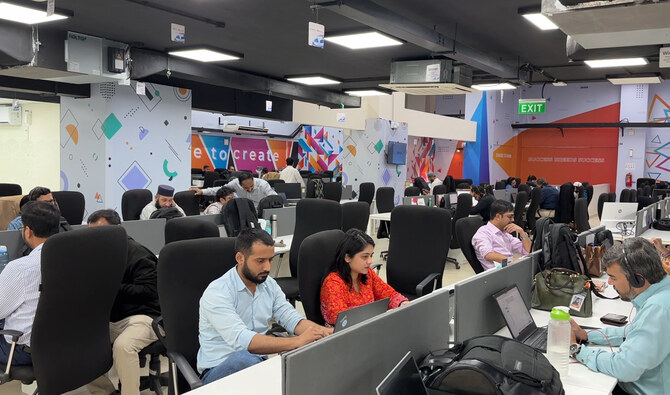 In this photograph, taken on March 8, 2024, people work at their stations at the Systems Limited, one of Pakistan’s largest software export companies, in Karachi. (AN Photo/File)