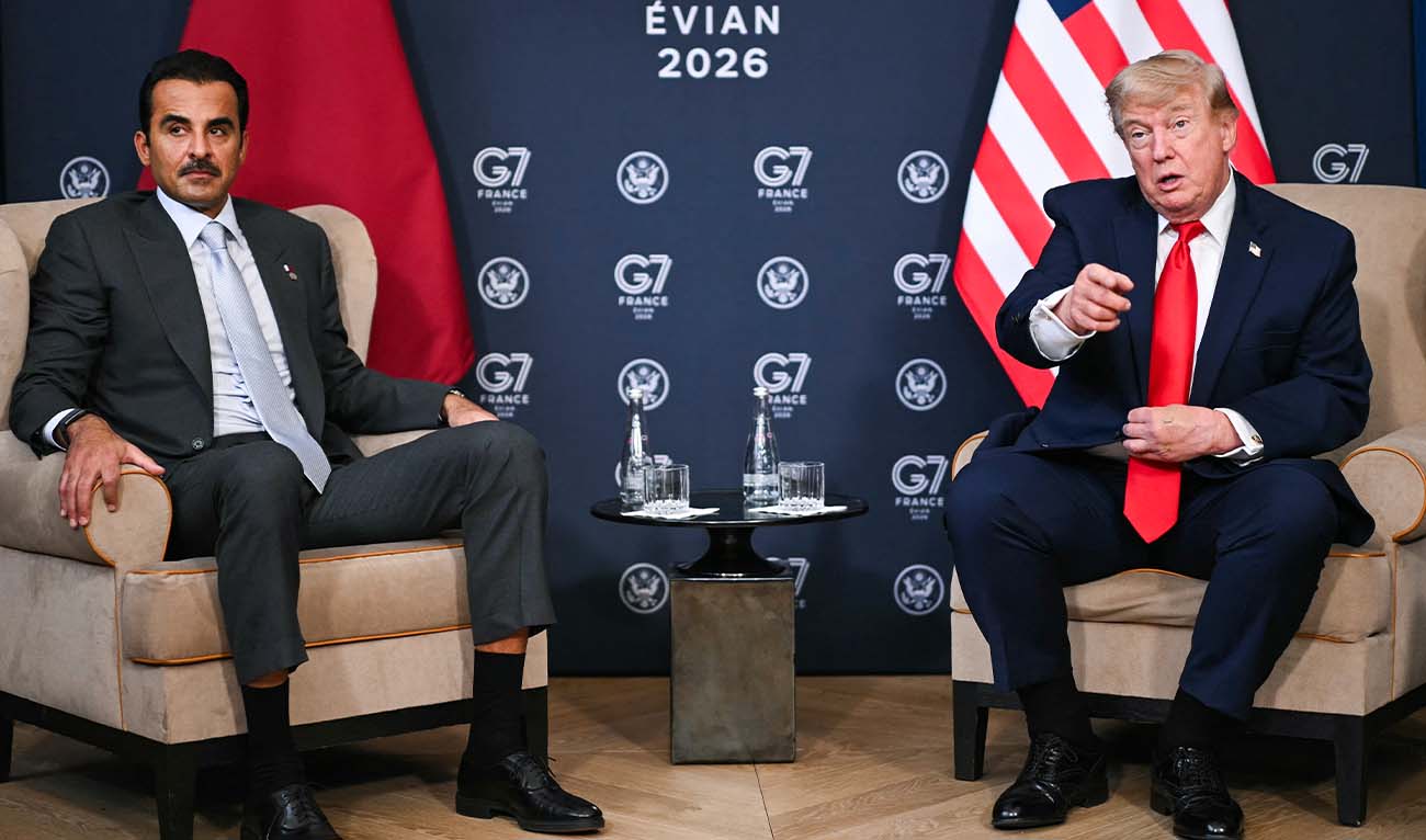US President Donald Trump (R) attends a bilateral meeting with Qatar's Emir Sheikh Tamim bin Hamad al-Thani during the G7 summit, in Evian, eastern France, on June 16, 2026. (AFP)