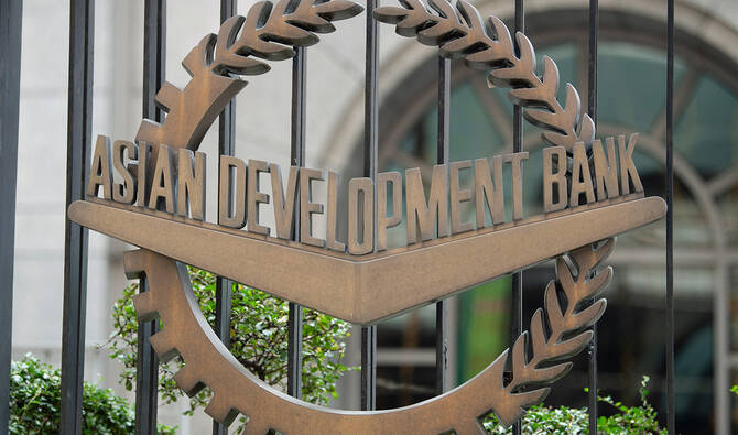 This photo shows a general view of the logo of the Asian Development Bank (ADB) outside the bank’s headquarters in Manila, Philippines, on April 15, 2025. (AFP/File)