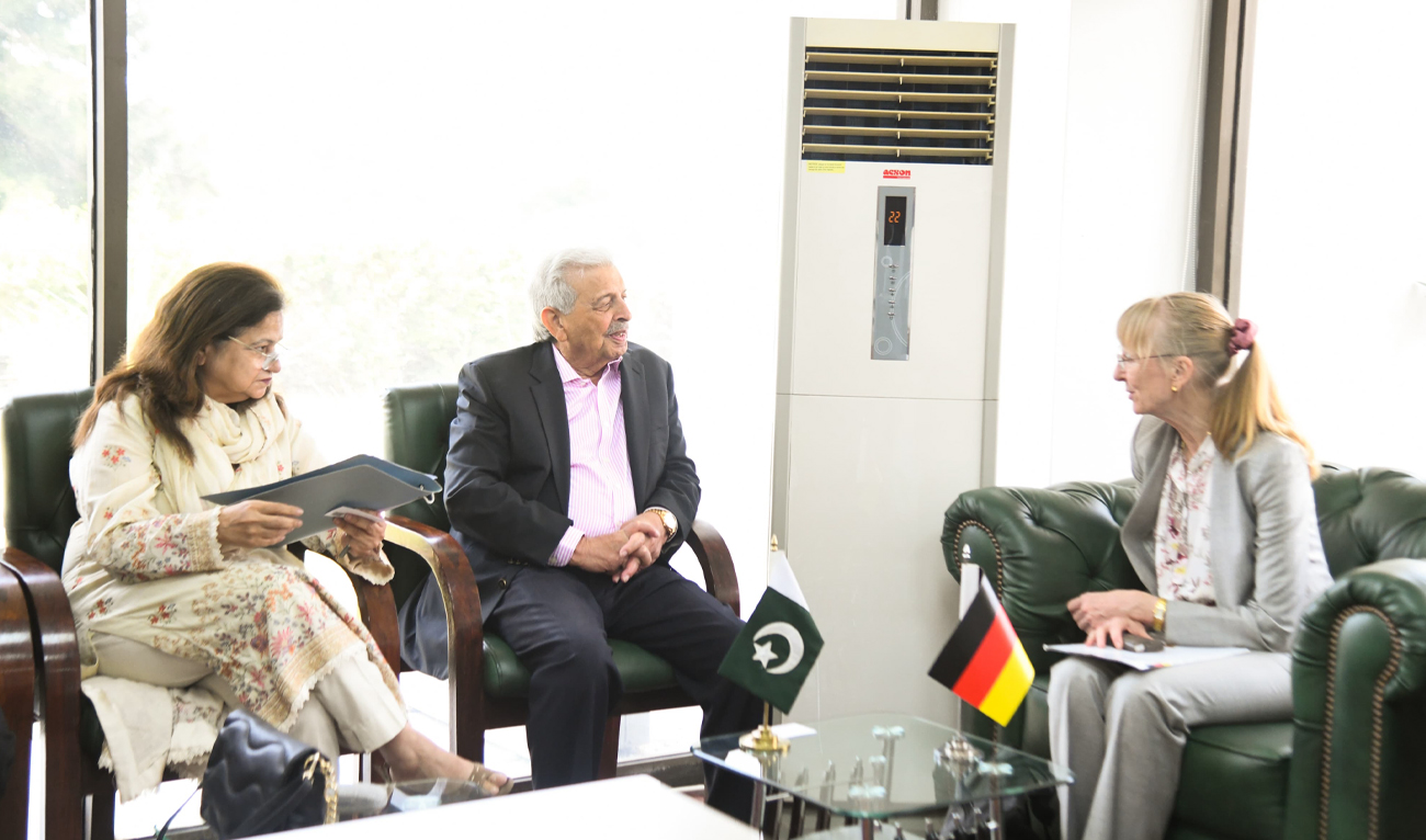 Pakistan’s Food Security Minister Rana Tanveer Hussain (center) speaks during a meeting with German Ambassador Ina Lepel (right) in Islamabad, Pakistan, on June 18, 2026. (Food Ministry)
