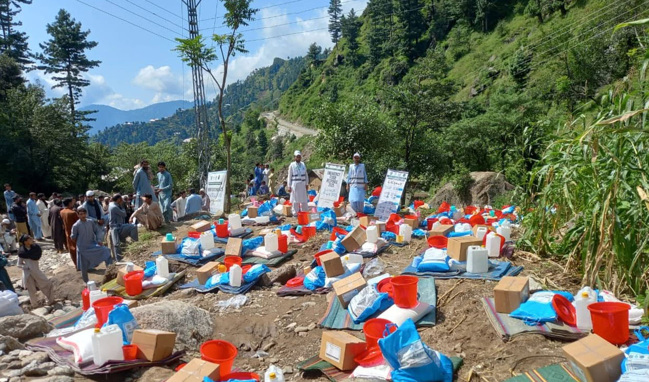 Relief supplies are stacked for distribution among affected families in Tehsil Puran, District Shangla, Khyber Pakhtunkhwa, on September 2, 2025. (Pakistan Poverty Alleviation Fund/Facebook)