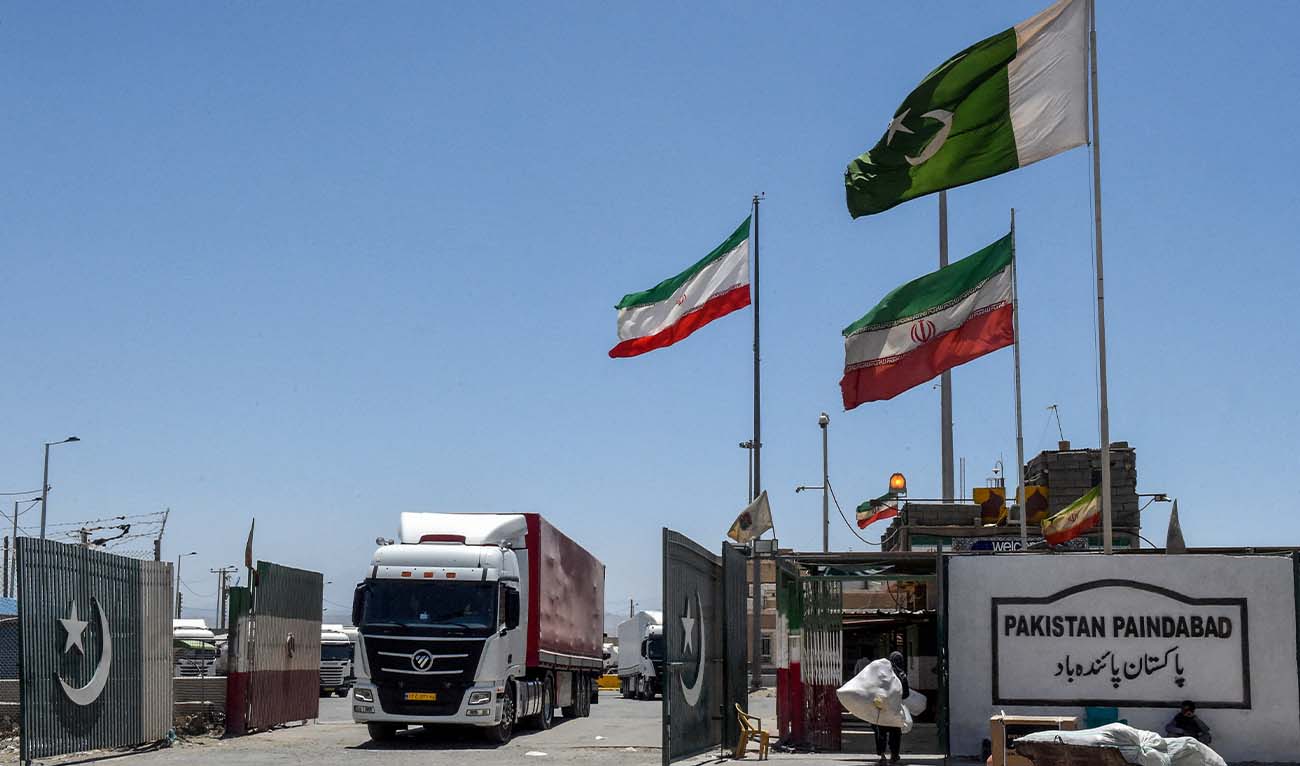 Iranian cargo trucks cross into the Pakistan-Iran border at Taftan, Balochistan province on June 18, 2025. (AFP/ file)