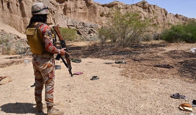 Pakistan's Frontier Corps stands guard at the siege site after armed militants ambushed a train in the remote mountainous area, at Pehro Kunri in Balochistan province on March 15, 2025. (AFP/ file)