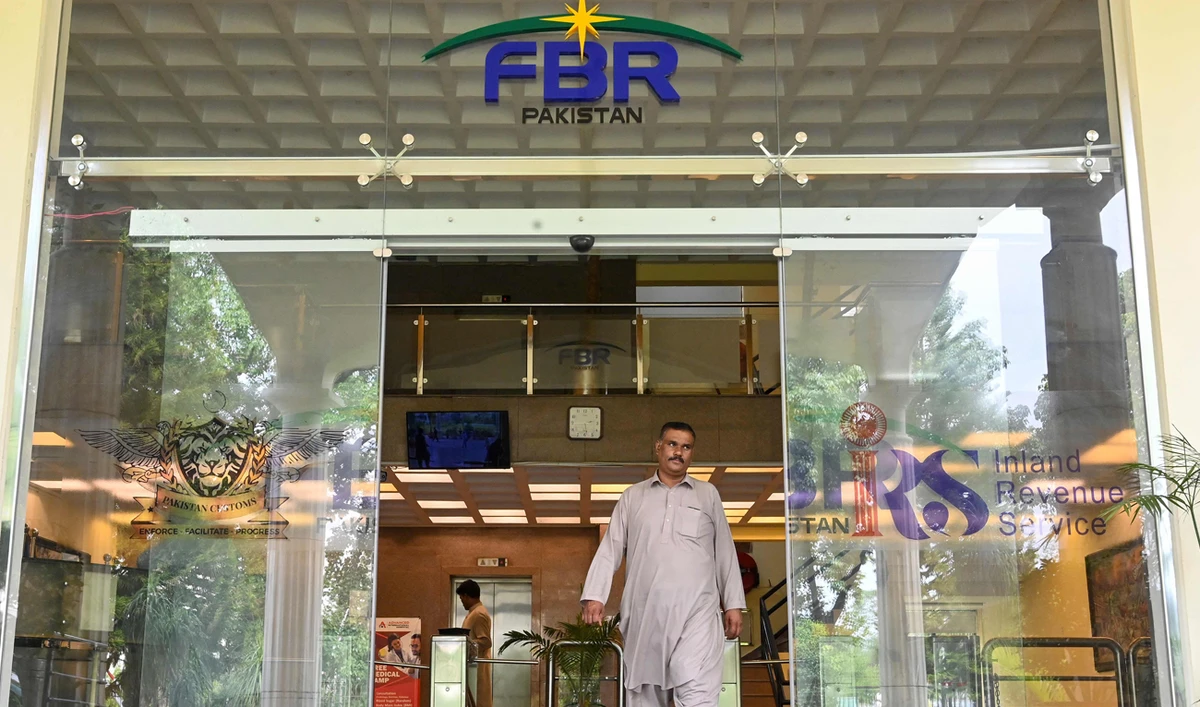 A man walks out of the Federal Board of Revenue (FBR) office in Islamabad, Islamabad, on July 4, 2024. (AFP/File)