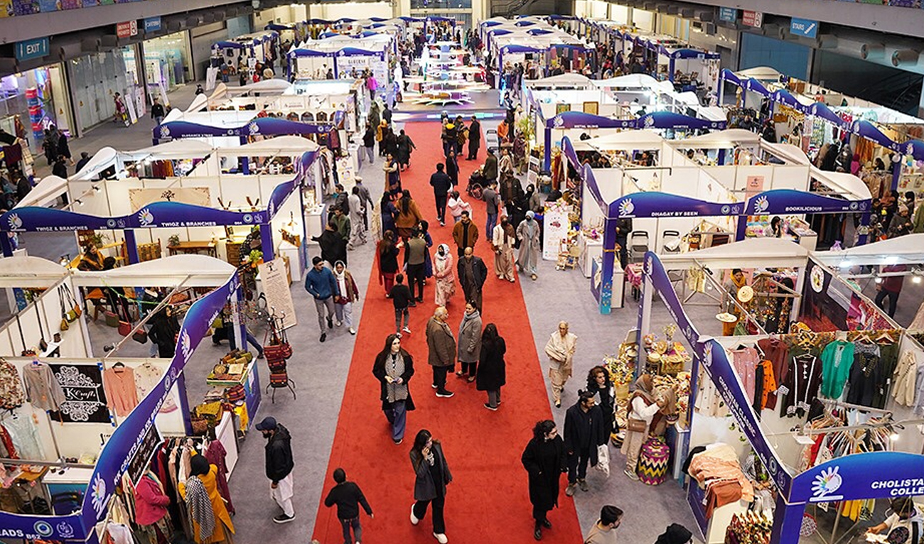 The handout image, released by the Trade Development Authority of Pakistan on January 12, 2025, shows visitors at the stalls of WEXNET 2025 expo at the Expo Center in Lahore, Pakistan. (TDAP/File)