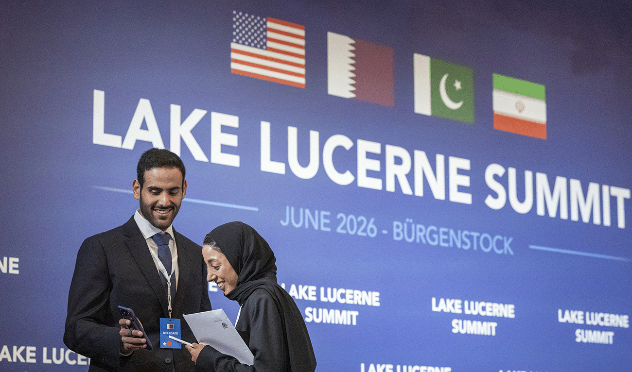 Delegation members react ahead of the start of a quadrilateral meeting between the United States, Iran, Pakistan and Qatar at the Burgenstock luxury hotel complex near Lake Lucerne, Switzerland, on June 21, 2026, as part of talks aimed at advancing a deal to end the Middle East conflict. (/File)