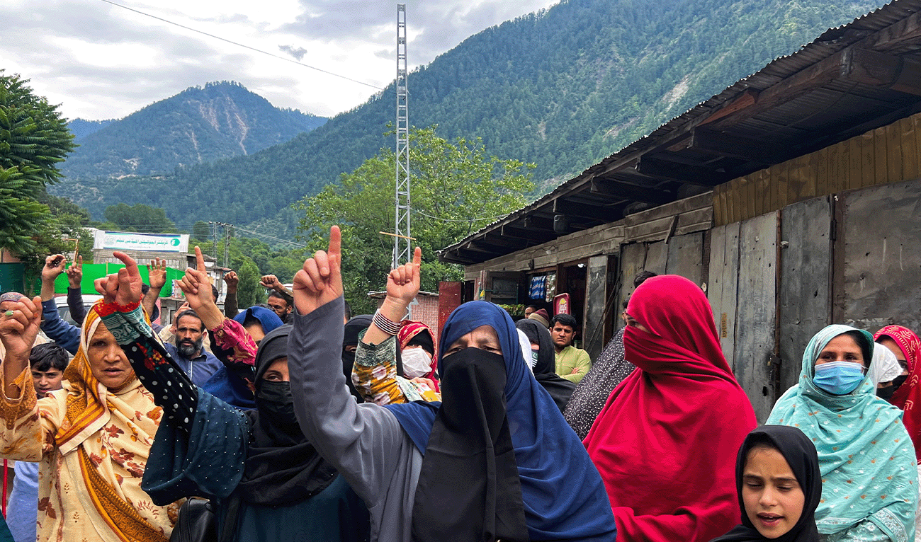 People chant slogans as they walk during a protest and shutter-down strike called by the banned Joint Awami Action Committee (JAAC), an alliance of civil society groups, in Neelum Valley, Azad Kashmir, June 21, 2026. (Reuters/File)