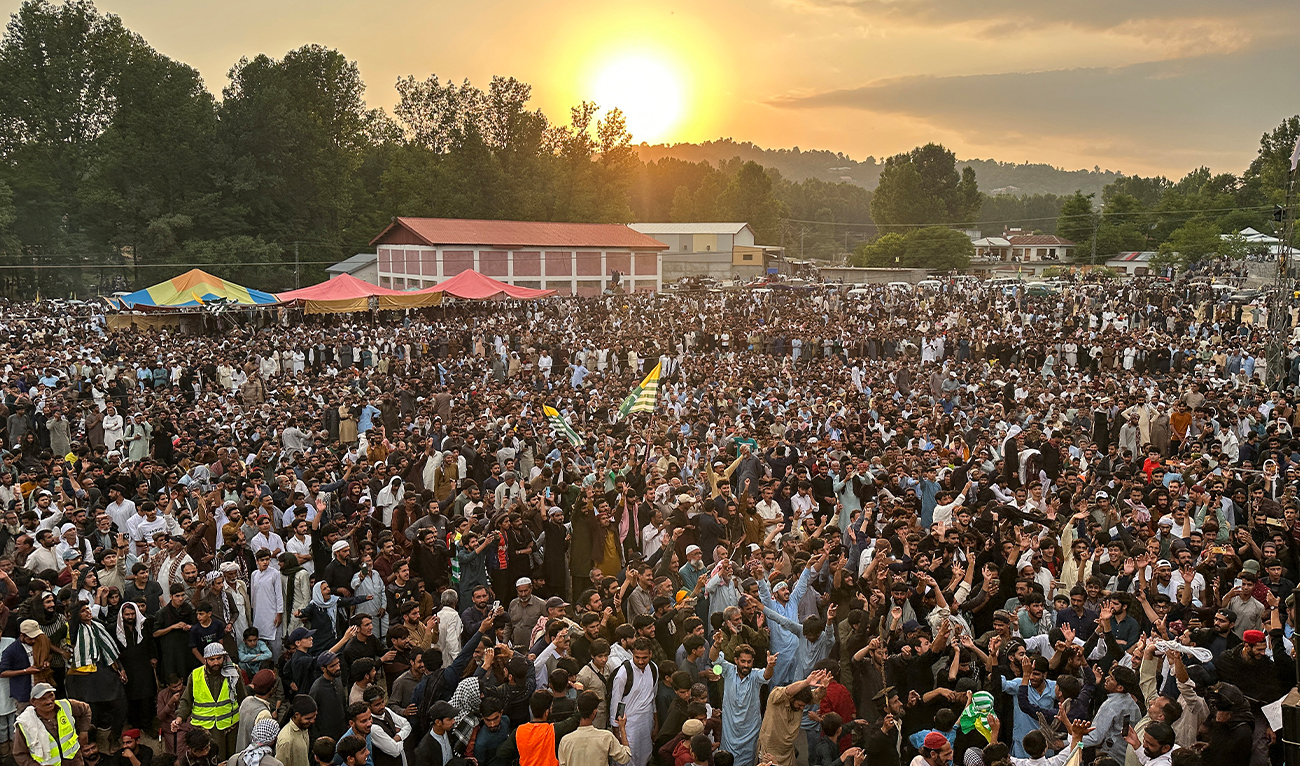 Supporters of the banned Joint Awami Action Committee (JAAC) gather during a sit-in protest in Rawalakot, in Azad Kashmir, on June 24, 2026. (AFP/File)