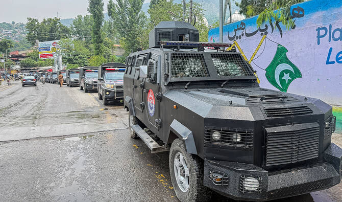 A convoy of police vehicles parked along a street of Muzaffarabad, the capital of Pakistan-administered Kashmir, on June 12, 2026 during a protest called by the Joint Awami Action Committee (JAAC) following the group’s ban under anti-terrorism laws by local authorities. (AFP/ file)