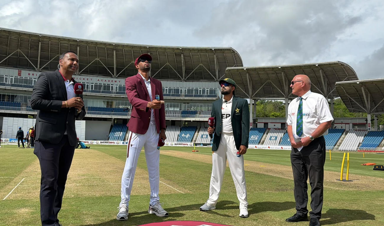 Roston Chase (second left) of West Indies tosses the coin as Babar Azam (second right) of Pakistan and match referee Jeff Crowe (right) look on during the 1st day of the 1st Test match between West Indies and Pakistan at Brian Lara Cricket Academy in Tarouba, Trinidad and Tobago on July 25, 2026. (PCB)