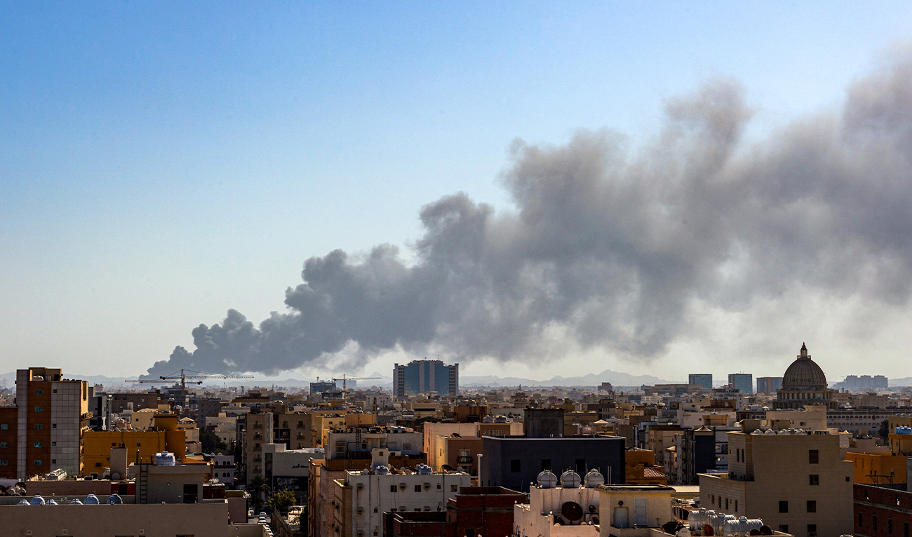 Smoke rises from a Saudi Aramco oil facility in Saudi Arabia's Red Sea coastal city of Jeddah, on March 26, 2022, following a reported Yemeni rebels attack. (AFP)