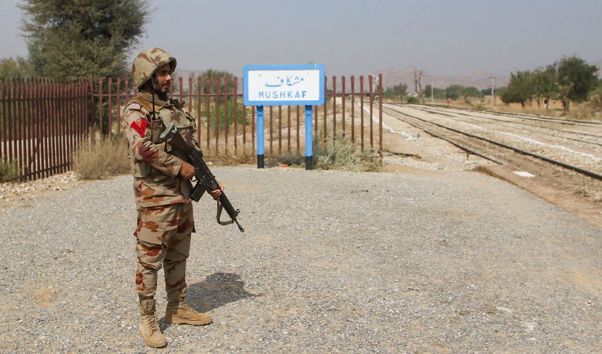A Pakistan Army soldier stands guard, after the attack on a train by separatist militants in Bolan, at the railway station in Mushkaf, Balochistan, Pakistan, March 12, 2025. (Reuters/File)