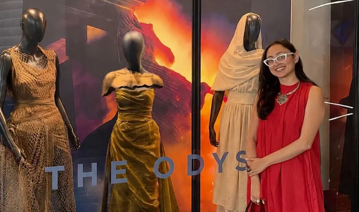 Pakistani artist and fashion designer Misha Japanwala poses beside costumes she created for Lupita Nyong'o's portrayal of Helen of Troy in Christopher Nolan's film The Odyssey. (Photo courtesy: Misha Japanwala/Instagram)