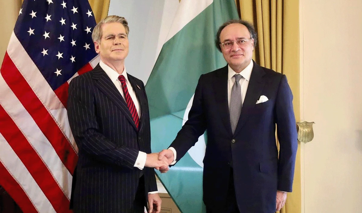 Pakistan's Finance Minister Mohammad Aurangzeb (right) shaking hands with US Treasury Secretary Scott Bessent in Washington DC, US, in a picture shared by Pakistan's Press Information Department on July 23, 2026. (PID)
