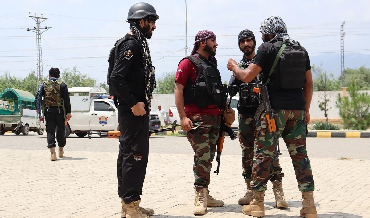 Security personnel stand guard after a militant attack on a checkpoint in Hangu district of Pakistan’s Khyber Pakhtunkhwa province on July 30, 2026. (AFP)