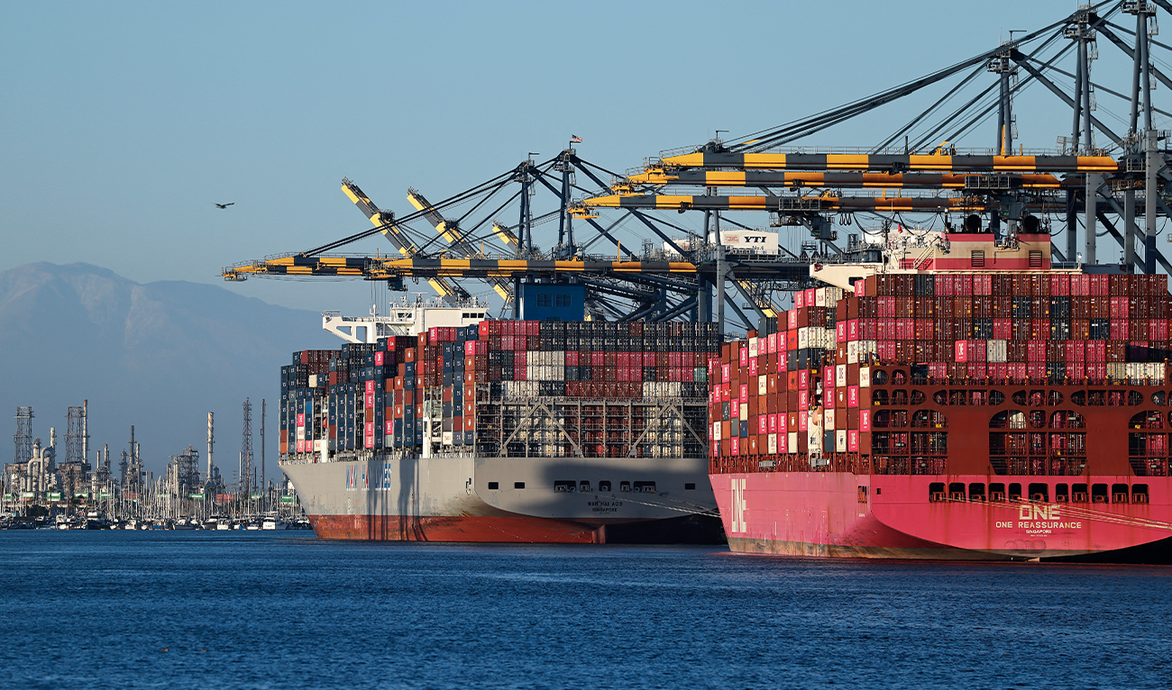 Shipping containers are stacked on container ships at the Port of Los Angeles on August 19, 2026 in Los Angeles, California. (AFP/ file)