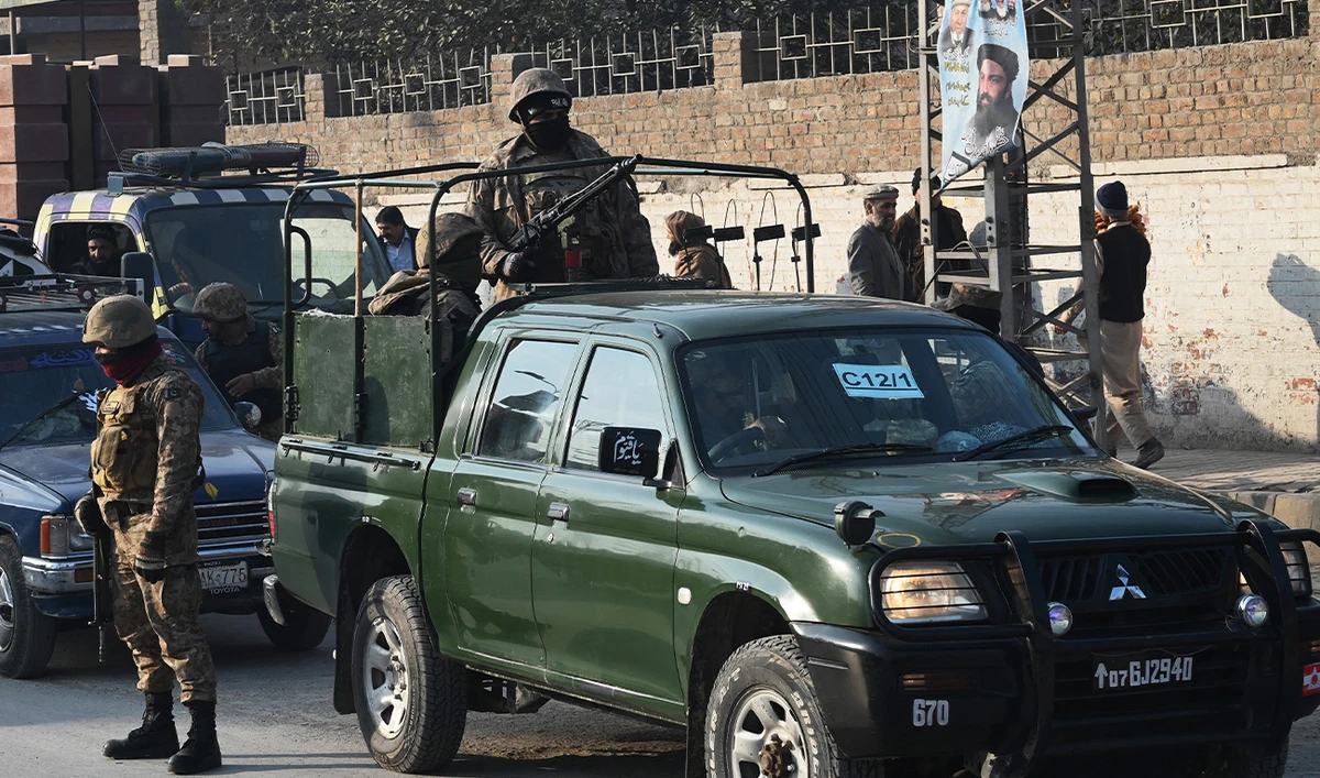 Pakistan Army personnel stand guard on a roadside in Peshawar on February 7, 2024. (AFP/File)
