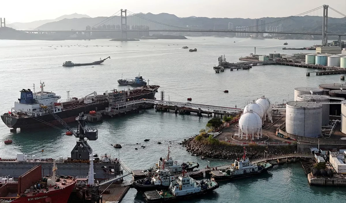 A drone view shows a Chinese-flagged oil tanker moored at an oil terminal at Tsing Yi port, with Tsing Ma bridge in the background, in Hong Kong, China March 19, 2026. (Reuters/File)