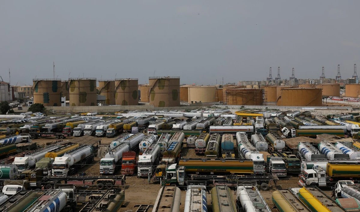 Oil tankers are seen parked, following the protest by the All Pakistan Oil Tankers Owners Association, demanding the hike in fares, expansion of quota in onshore white pipeline transportation and permit to use old vehicles, in Karachi, Pakistan September 19, 2023 (Reuters/File)