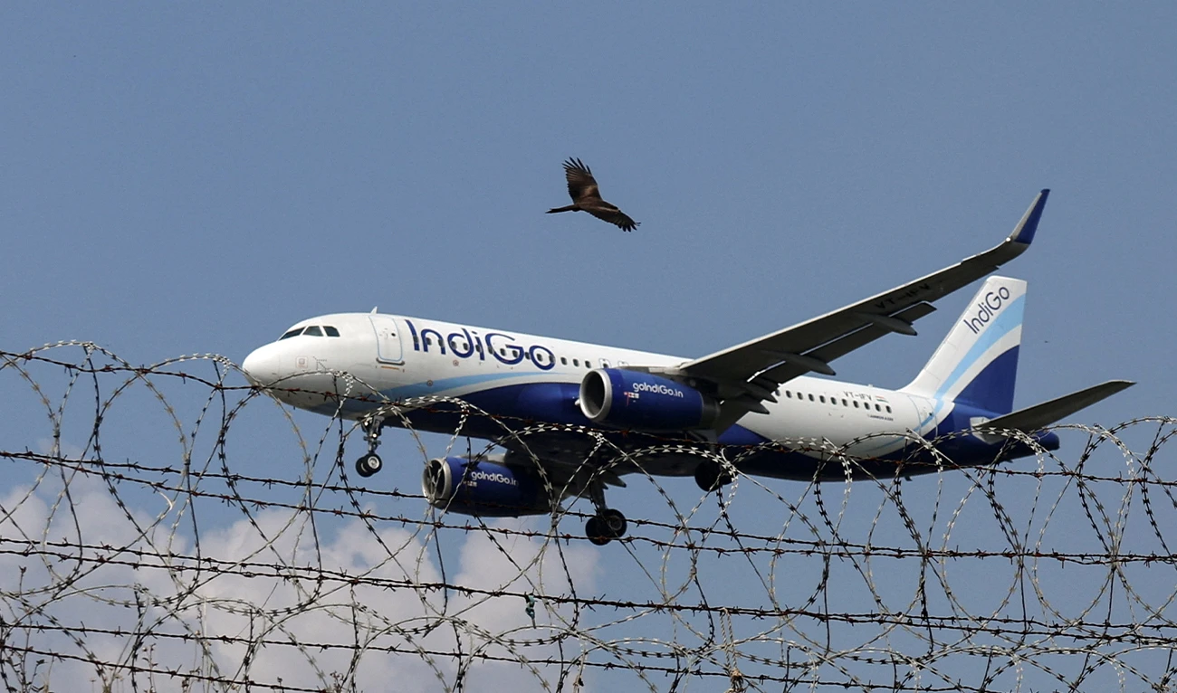 An IndiGo Airlines aircraft flies low as it prepares to land in Mumbai, India, on October 22, 2025. (Reuters/File)