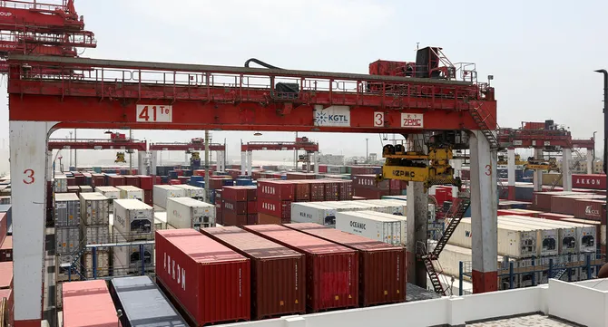 Shipping containers are stacked at Karachi Gateway Terminal Limited (KGTL) in the port area of Karachi, Pakistan, June 23, 2026. (Reuters/File)