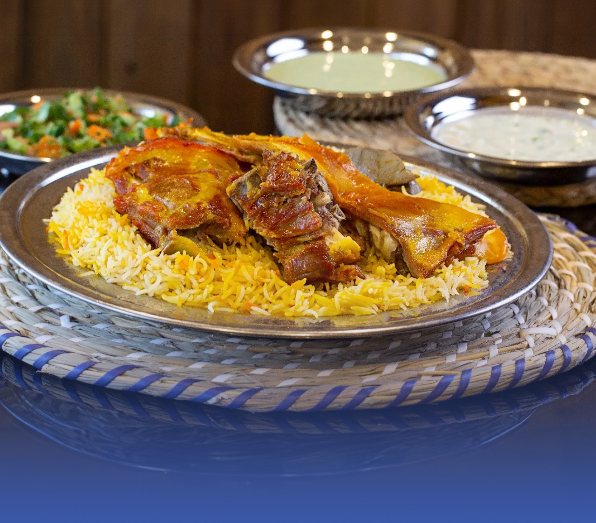 "المندي الحساوي".. نخيل وأرض