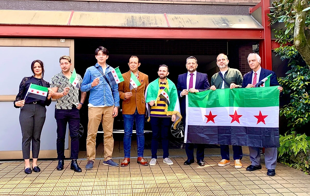 Syria raises new flag at Tokyo embassy, hopes for closer relations with Japan