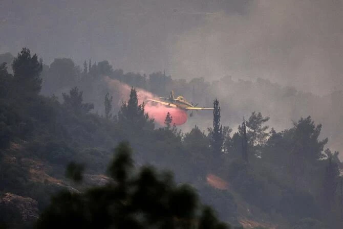 Israel police evacuate towns as bushfires spread near Jerusalem