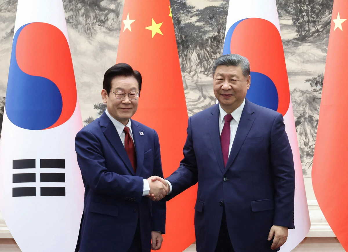 Lee Jae Myung is the first South Korean leader to visit the Chinese capital in six years and his meeting with Xi came a day after the nuclear-armed North fired two ballistic missiles into the Sea of Japan. (AFP)