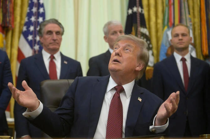 President Donald Trump speaks in the Oval Office of the White House on Friday. (AP)