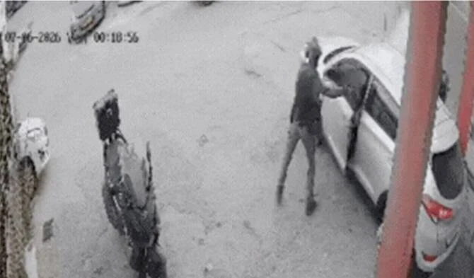 Shocking footage shows moment Israeli police officer throws stun grenade in car