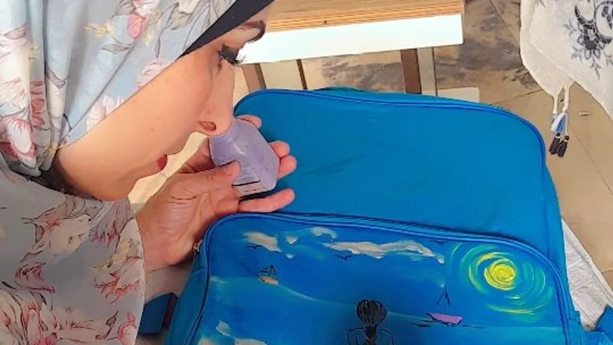 Painted backpacks offer children in Gaza some sense of normality