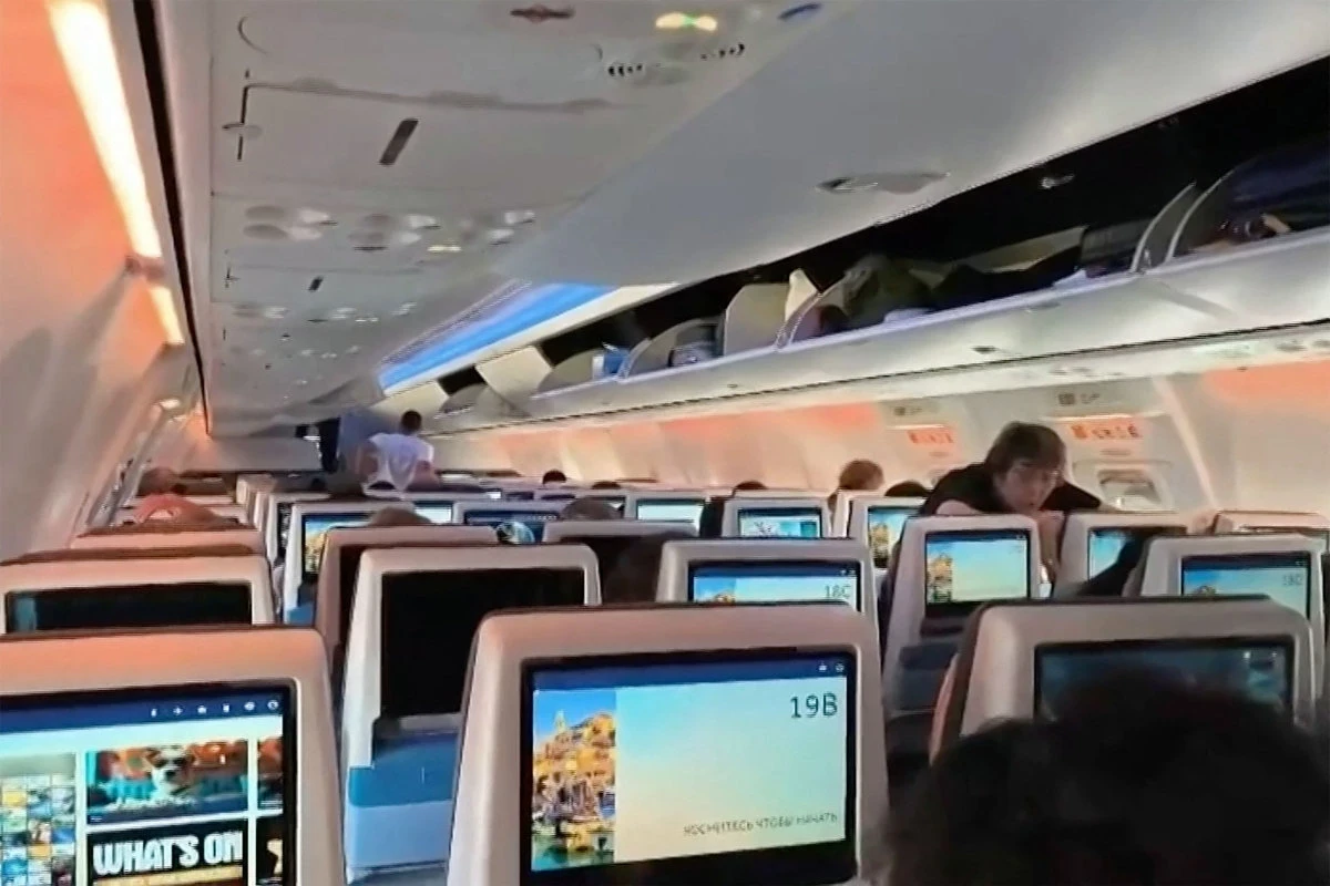 Who are the mystery men who stepped in to keep the FlyDubai plane from ...